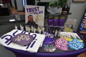 Umamii small-batch cannabis flower and gummies showcased at Wilde Roots pop-up, featuring unique flavor profiles and expertly crafted products